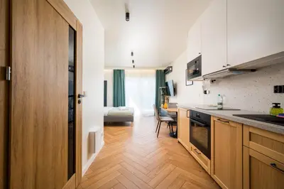 Kuchnia lub aneks kuchenny w obiekcie Modern Flow Apartment by Bookinghost