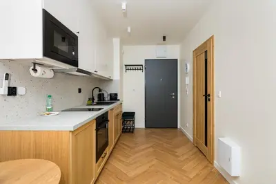 Kuchnia lub aneks kuchenny w obiekcie Modern Flow Apartment by Bookinghost