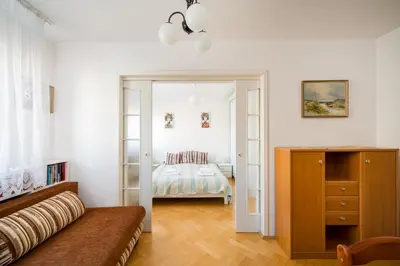 Łóżko lub łóżka w pokoju w obiekcie Ogrodowa City Comfort Apartment by Bookinghost