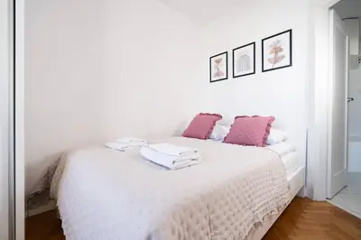 Łóżko lub łóżka w pokoju w obiekcie Cappuccino Apartment Zielna City Center