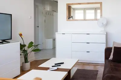 Telewizja i/lub zestaw kina domowego w obiekcie Cappuccino Apartment Zielna City Center