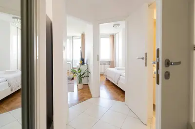Łóżko lub łóżka w pokoju w obiekcie Cappuccino Apartment Zielna City Center