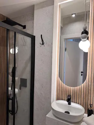 Łazienka w obiekcie Family & Business Apartments PREMIUM SPA No 3 - 2 Bedroom with Private Jacuzzi, Balcony, Parking