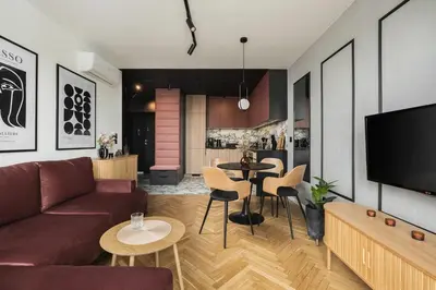 Telewizja i/lub zestaw kina domowego w obiekcie SKY7 Piwarskiego Design Apartament z widokiem