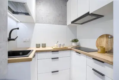 Kuchnia lub aneks kuchenny w obiekcie Komfortowy apartament w pobliżu Starego Miasta