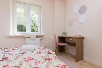 Łóżko lub łóżka w pokoju w obiekcie Mokotow Apartments Reytan by Noclegi Renters
