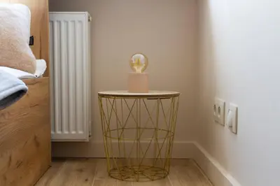 Łóżko lub łóżka w pokoju w obiekcie Mokotow Apartments Reytan by Noclegi Renters