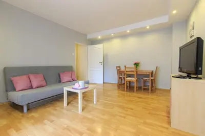 Telewizja i/lub zestaw kina domowego w obiekcie Rental Apartments Warecka