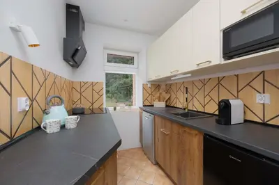 Plan piętra w obiekcie Charming House in the Capital with Two Parking Spaces by Noclegi Renters