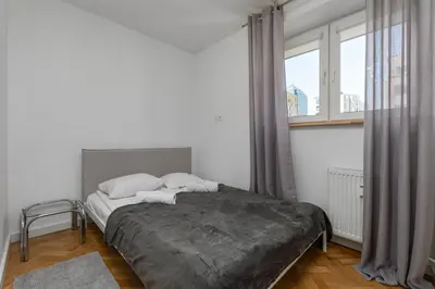 Łóżko lub łóżka w pokoju w obiekcie Złota 67 by Homeprime