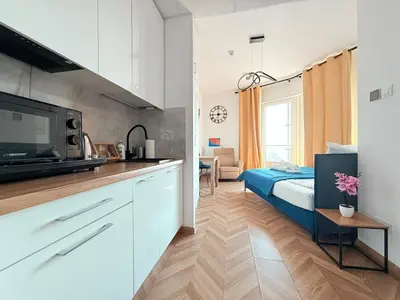 Kuchnia lub aneks kuchenny w obiekcie Sky Apartments Wola Tower