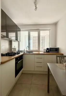 Kuchnia lub aneks kuchenny w obiekcie Cozy Stay City Center Apartment Warsaw