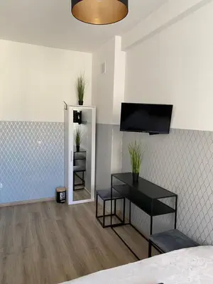 Telewizja i/lub zestaw kina domowego w obiekcie ClickTheFlat Moczydło Apart Rooms