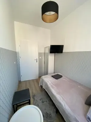 Łóżko lub łóżka w pokoju w obiekcie ClickTheFlat Moczydło Apart Rooms