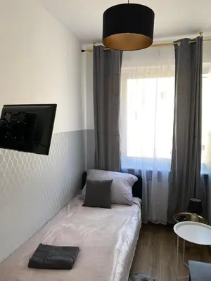 Łóżko lub łóżka w pokoju w obiekcie ClickTheFlat Moczydło Apart Rooms