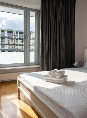 Łóżko lub łóżka w pokoju w obiekcie Mokotów Serenity Premium Apartment by BookingHost