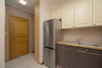 Kuchnia lub aneks kuchenny w obiekcie Perfectly Located Exceptional Apartment in Warsaw by Noclegi Renters
