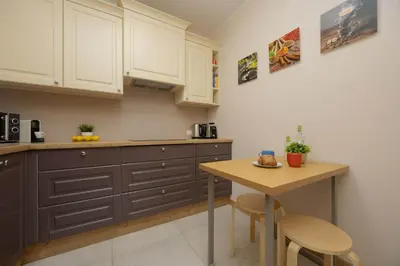 Kuchnia lub aneks kuchenny w obiekcie Perfectly Located Exceptional Apartment in Warsaw by Noclegi Renters