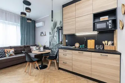 Kuchnia lub aneks kuchenny w obiekcie Modern studio AC Batorego by VAYA STAYS
