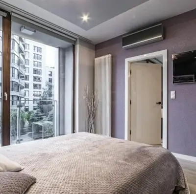 Łóżko lub łóżka w pokoju w obiekcie Luxury apart