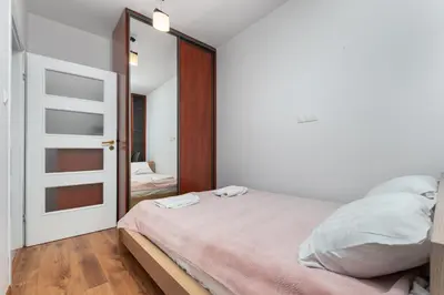 Łóżko lub łóżka w pokoju w obiekcie Jana Kazimierza 28 by Homeprime