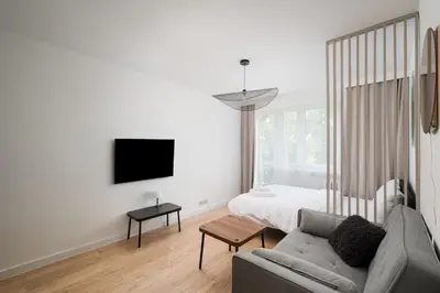 Telewizja i/lub zestaw kina domowego w obiekcie Broniewskiego Comfort Flow Apartment by Bookinghost