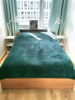 Łóżko lub łóżka w pokoju w obiekcie Green Warsaw Experience