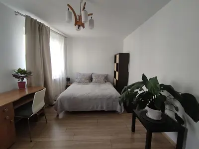 Łóżko lub łóżka w pokoju w obiekcie Room 1