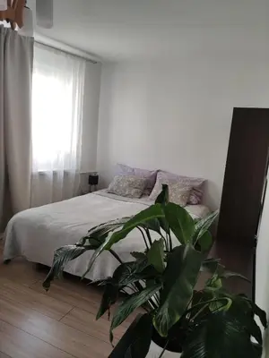 Łóżko lub łóżka w pokoju w obiekcie Room 1