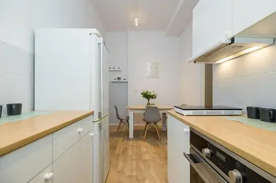 Kuchnia lub aneks kuchenny w obiekcie Mokotowska Apt 10 ROOMS SuperApart