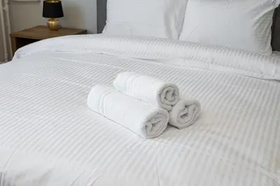 Łóżko lub łóżka w pokoju w obiekcie Wola Smocza Comfort Studio by BookingHost
