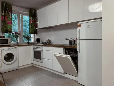 Kuchnia lub aneks kuchenny w obiekcie City Heart Apartment