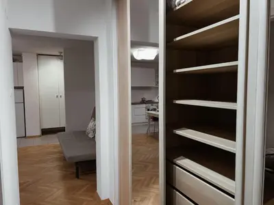 Łóżko lub łóżka w pokoju w obiekcie City Heart Apartment