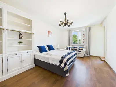 Łóżko lub łóżka w pokoju w obiekcie Aleje Jerozolimskie 155 ROOMS SuperApart - blisko Dworca Zachodniego