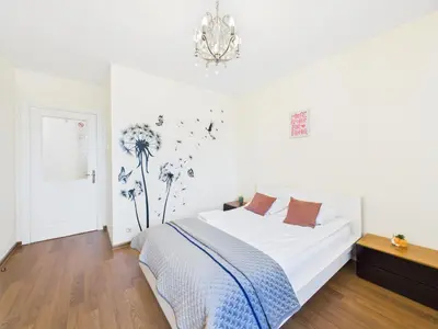Łóżko lub łóżka w pokoju w obiekcie Aleje Jerozolimskie 155 ROOMS SuperApart - blisko Dworca Zachodniego