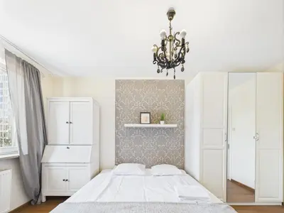 Łóżko lub łóżka w pokoju w obiekcie Aleje Jerozolimskie 155 ROOMS SuperApart - blisko Dworca Zachodniego
