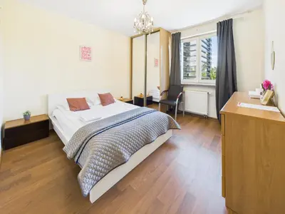 Łóżko lub łóżka w pokoju w obiekcie Aleje Jerozolimskie 155 ROOMS SuperApart - blisko Dworca Zachodniego