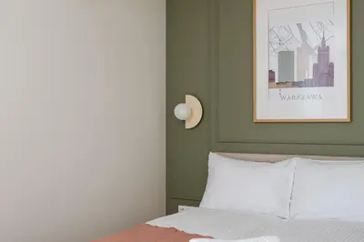 Łóżko lub łóżka w pokoju w obiekcie Malinova Leaf Apartment by BookingHost