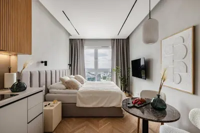 Łóżko lub łóżka w pokoju w obiekcie View 21 Floor The WAW Wars
