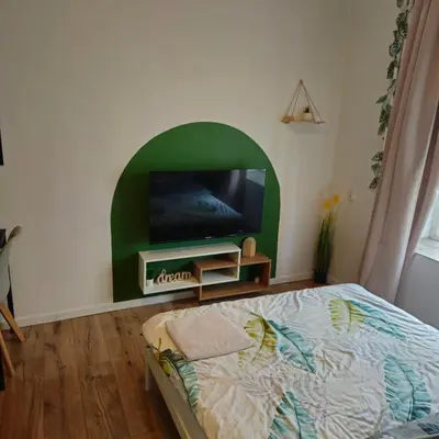 Łóżko lub łóżka w pokoju w obiekcie Smulik Flat 23