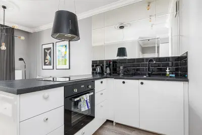 Kuchnia lub aneks kuchenny w obiekcie RentPlanet - Apartament Siedmiogrodzka