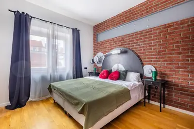 Łóżko lub łóżka w pokoju w obiekcie Apartament Rynek Starego Miasta A