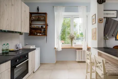 Kuchnia lub aneks kuchenny w obiekcie Metro Wierzbno Warm Apartment by BookingHost