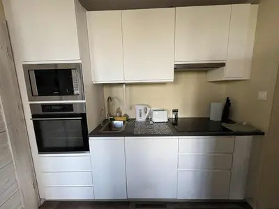 Kuchnia lub aneks kuchenny w obiekcie Apartament Bazyliańska, metro Bródno