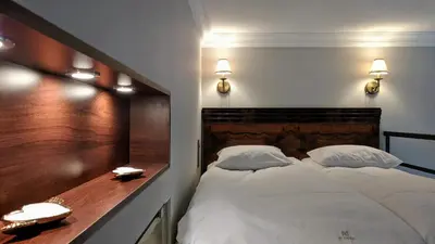 Łóżko lub łóżka w pokoju w obiekcie mythings Apartments