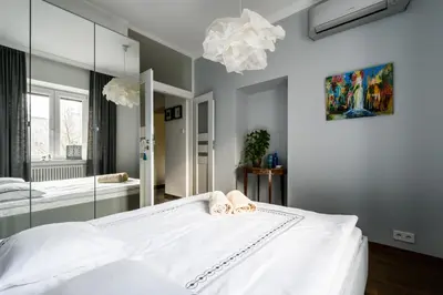 Łóżko lub łóżka w pokoju w obiekcie mythings Apartments