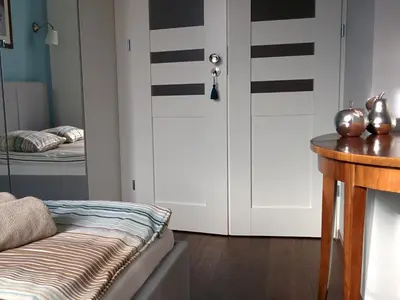 Łóżko lub łóżka w pokoju w obiekcie mythings Apartments