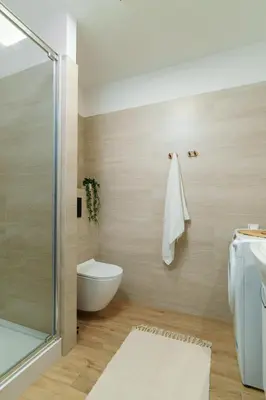 Łazienka w obiekcie LYNA Home Plus - Royal Bed Residence