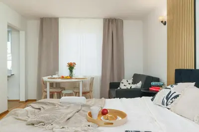Łóżko lub łóżka w pokoju w obiekcie LYNA Home Plus - Royal Bed Residence