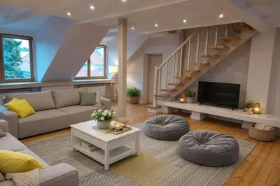Część wypoczynkowa w obiekcie Two-level Sielecka Apartment
